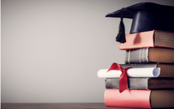 Graduation cap and books