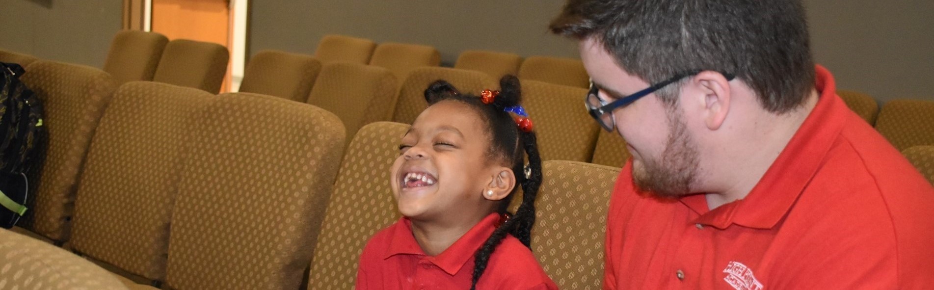 Students reading and laughing